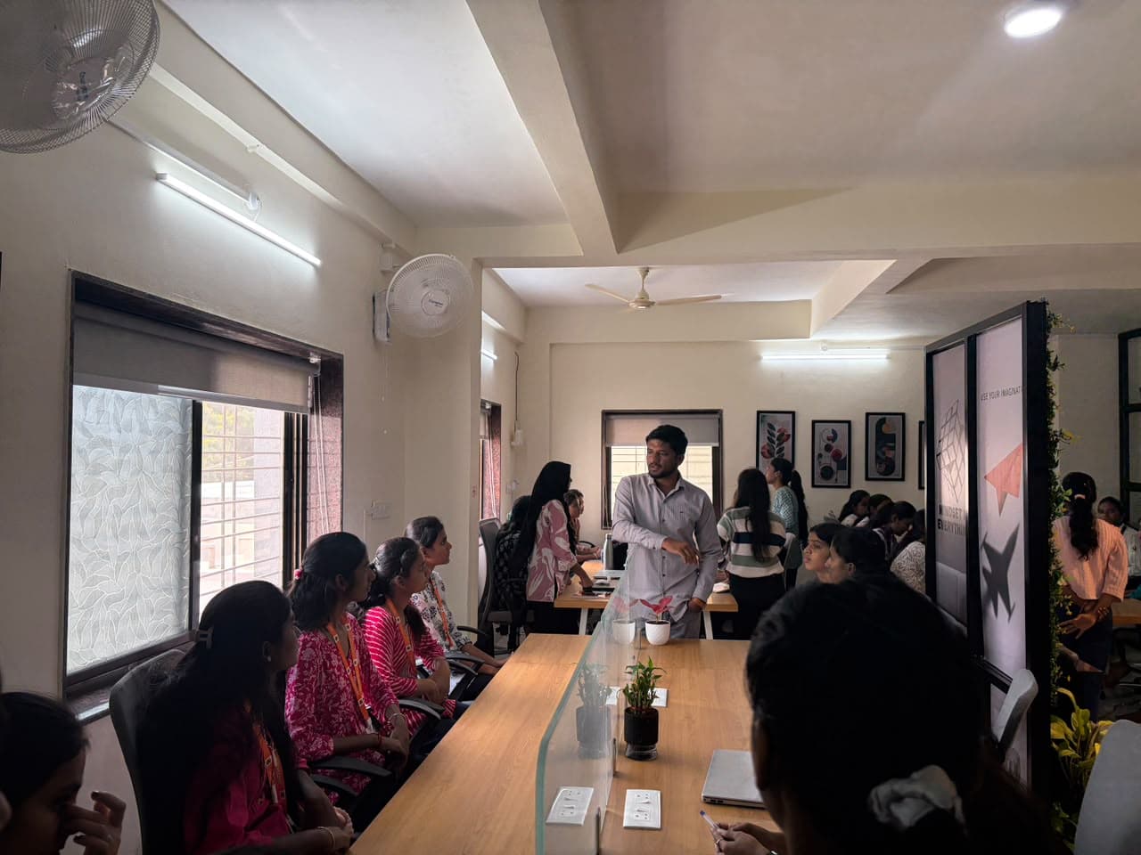 Team presentation and discussion in conference room